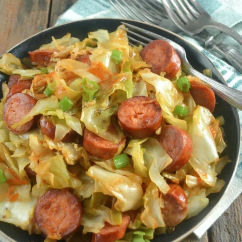 Cabbage sausage dish with kielbasa, perfect for family dinners.