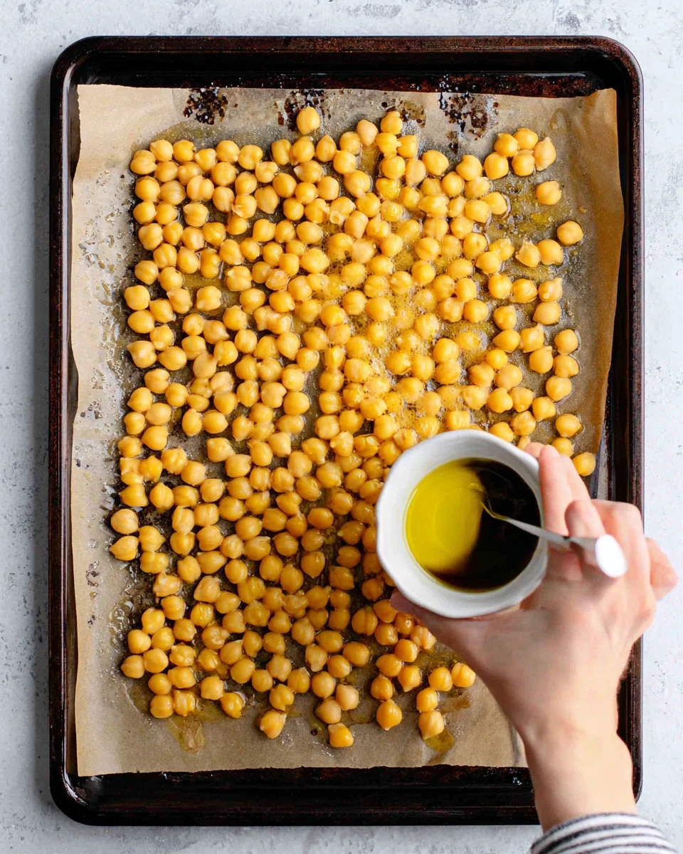 Crispy roasted chickpeas preparation with olive oil