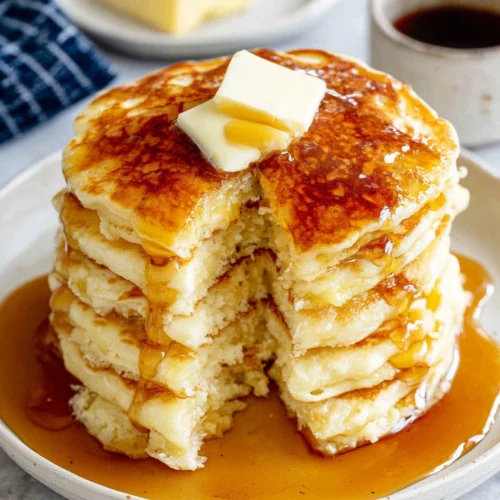 Delicious Gluten-Free Pancakes for a Perfect Morning 1 Delicious gluten-free pancakes with syrup and butter.