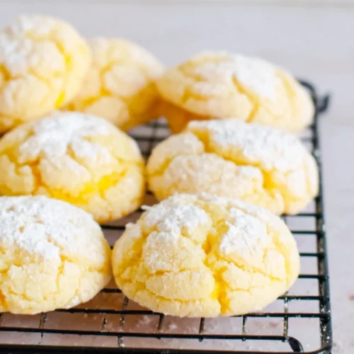 Lemon crinkle cookies, soft and chewy, coated in powdered sugar.