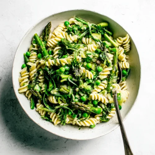 Spring Pasta Salad: A Fresh and Zesty Delight 1 Colorful spring pasta salad with asparagus and peas.