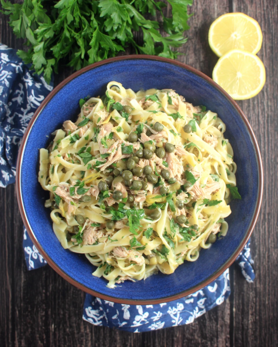 Tuna pasta with gluten-free fettucine, capers, and lemon.