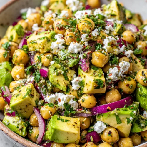 Healthy chickpea salad with avocado and feta.