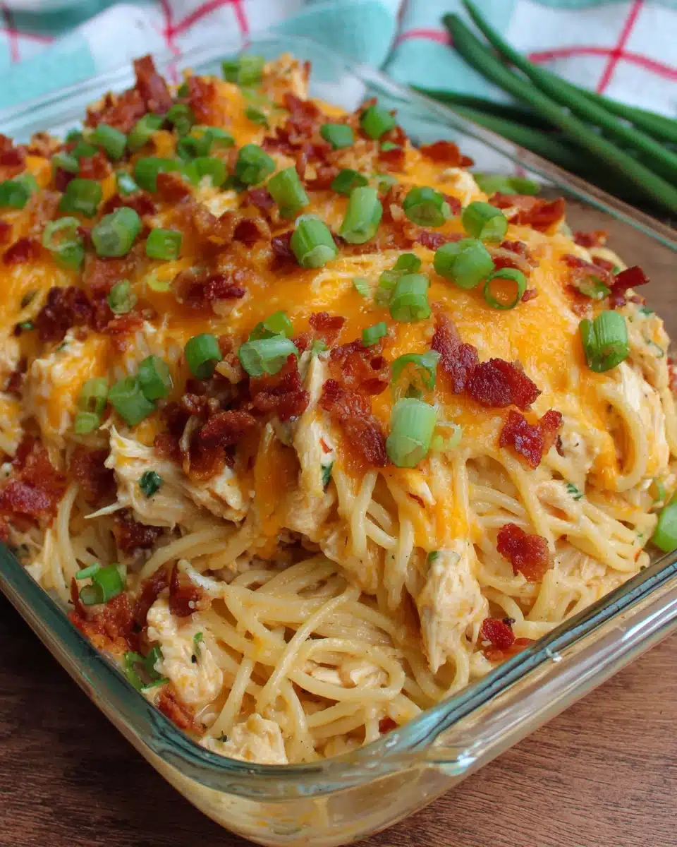 Creamy crack chicken spaghetti with cheese and bacon.