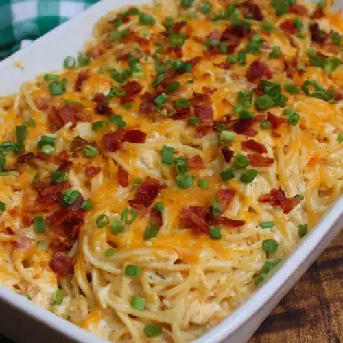 Delicious crack chicken spaghetti with cheese and bacon.