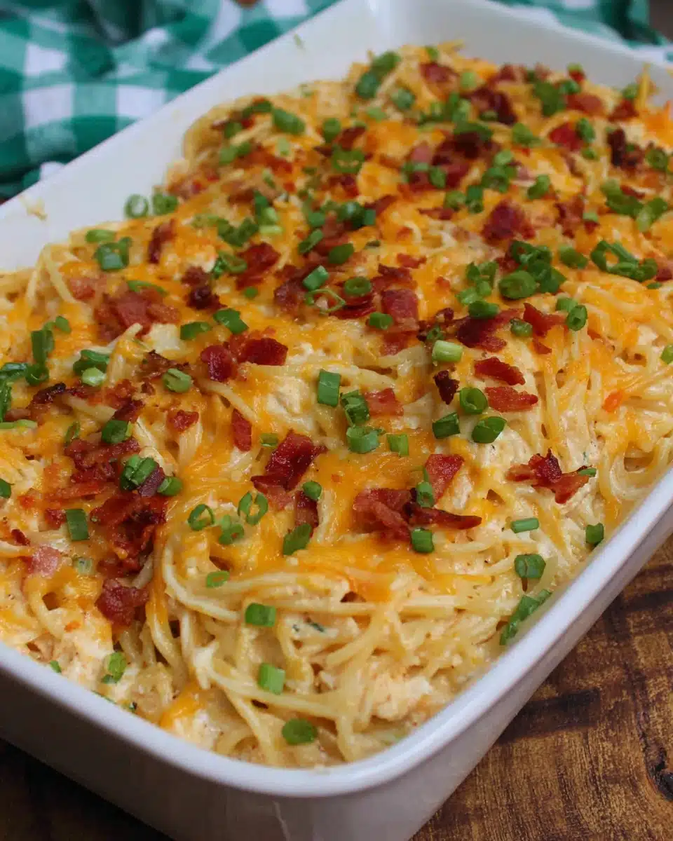 Delicious crack chicken spaghetti with cheese and bacon.