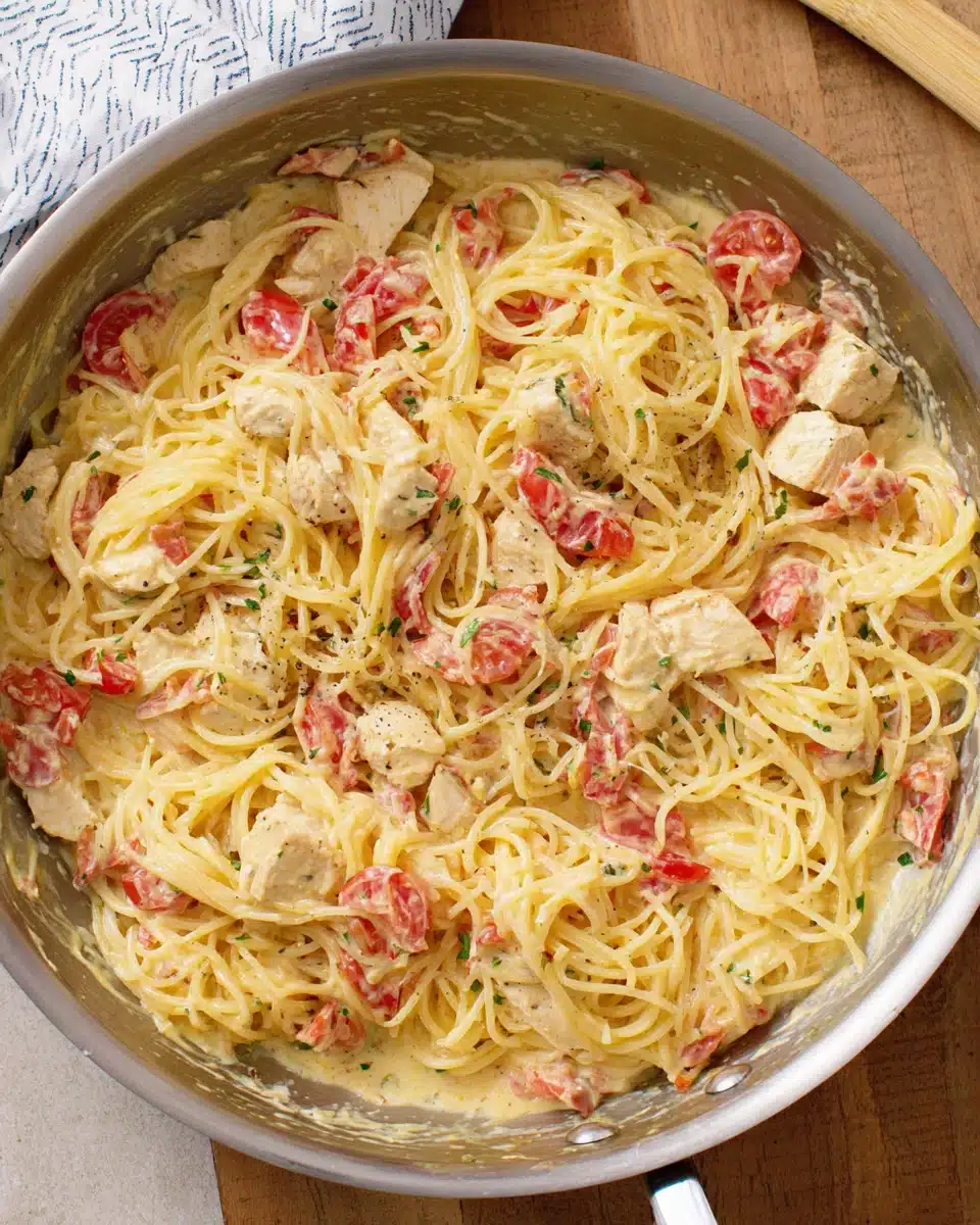Creamy chicken spaghetti dish featuring tender pasta and flavorful sauce.