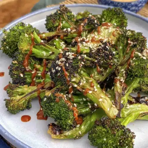 Spicy gochujang broccoli dish on a plate.