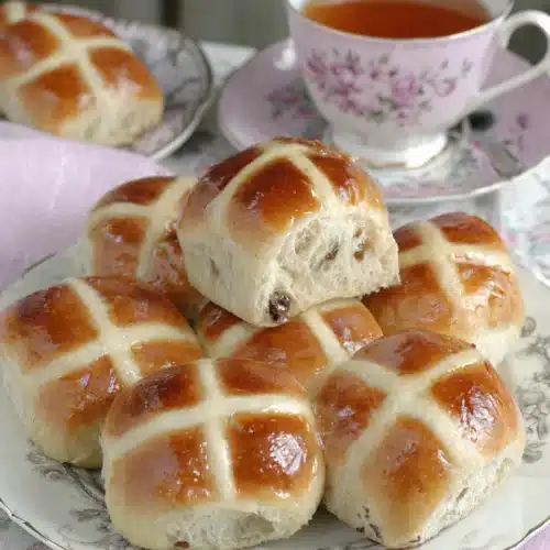 Mrs. Rabbit's hot cross buns on a floral plate