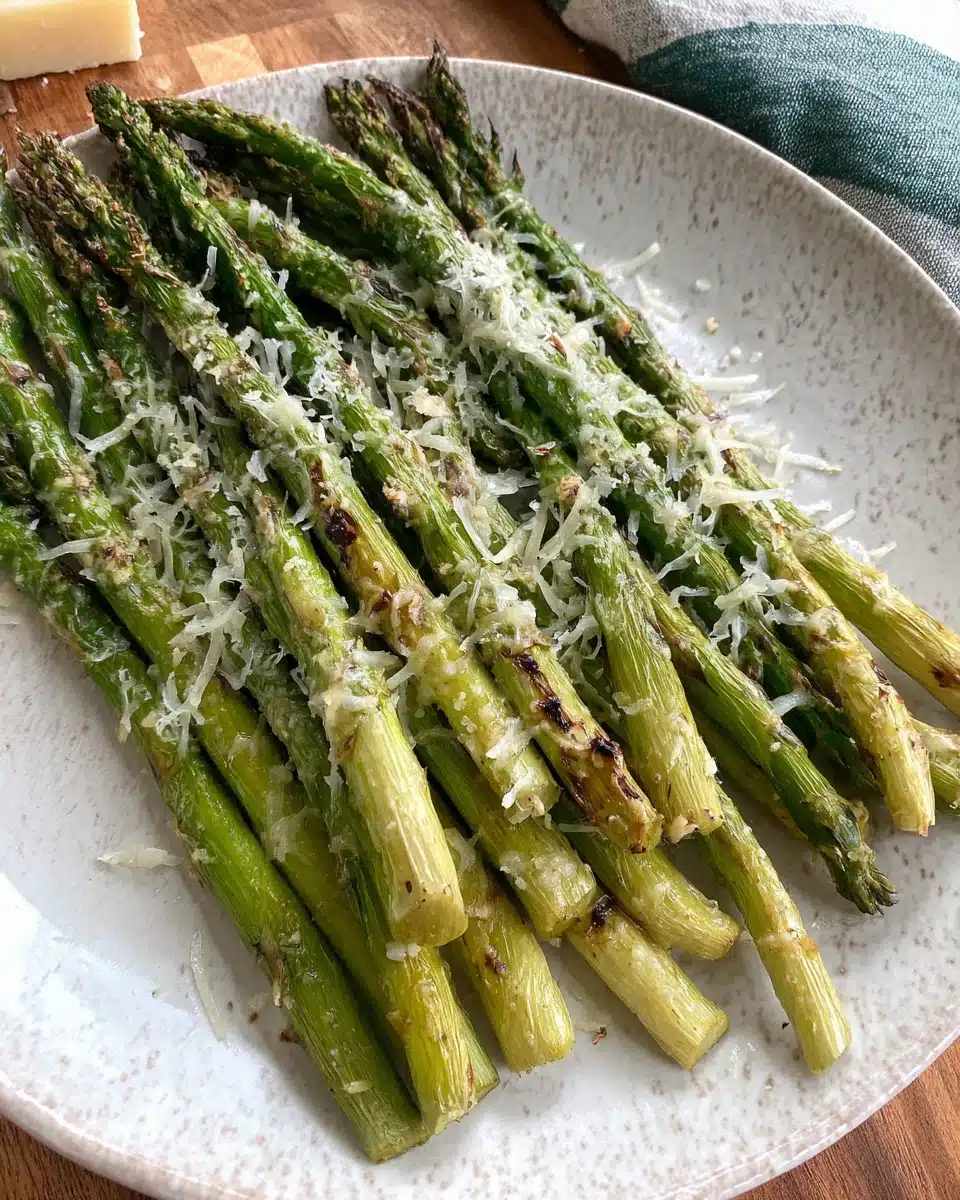 Oven roasted garlic parmesan asparagus on a plate.