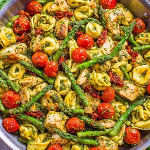 Pesto chicken tortellini with chicken, veggies, and tortellini.