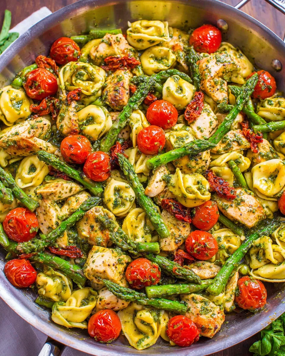 Pesto chicken tortellini with chicken, veggies, and tortellini.