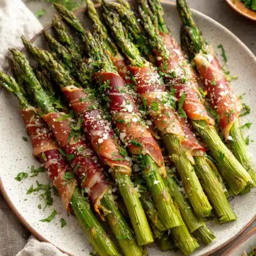 Delicious prosciutto wrapped asparagus ready to serve.