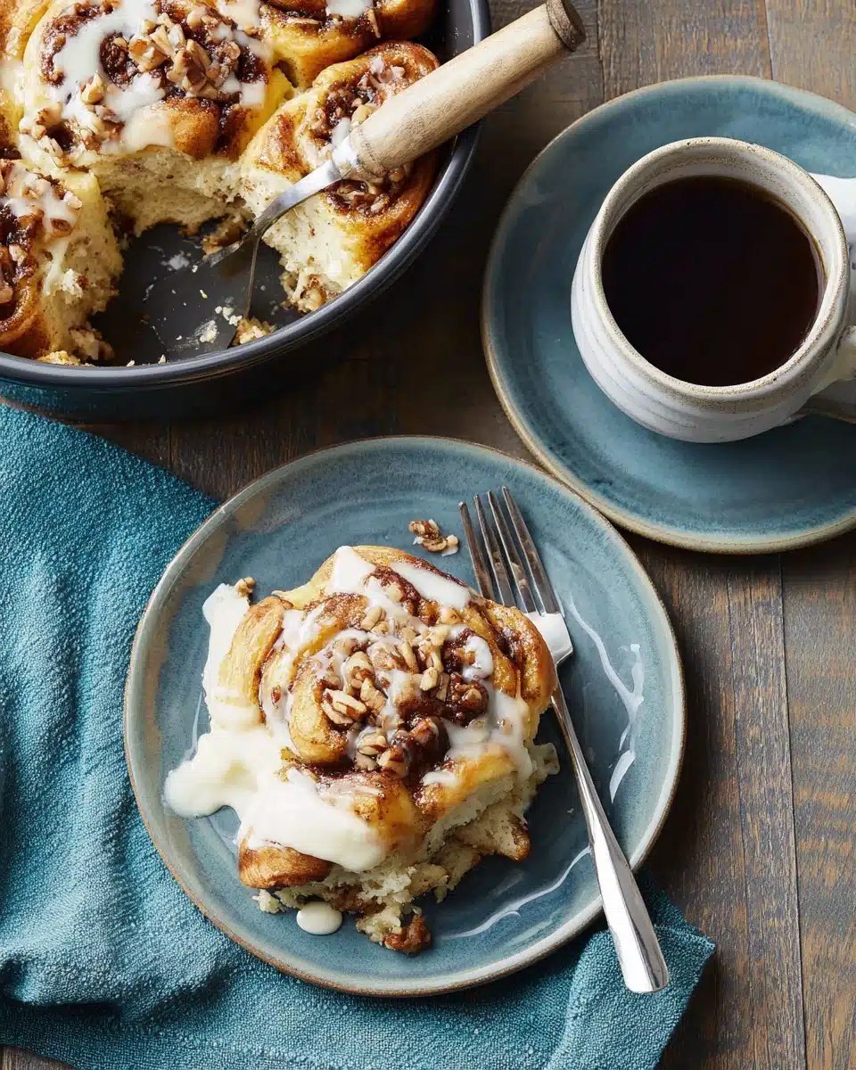 Slow Cooker Cinnamon Roll Casserole Delight Slow cooker cinnamon roll casserole with coffee on a table.
