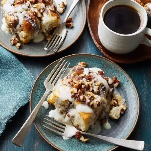 Slow Cooker Cinnamon Roll Casserole: An Indulgent Breakfast Delight 1 Slow cooker cinnamon roll casserole with nuts and icing.