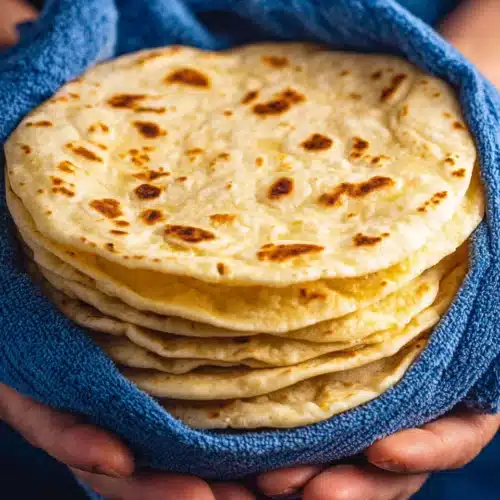 Freshly made soft flour tortillas ready to eat.