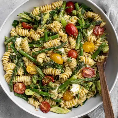 Spring pasta salad with honey mustard dressing and fresh veggies.