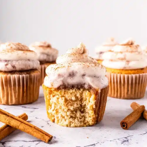 Churro cupcakes with cream cheese frosting and cinnamon.