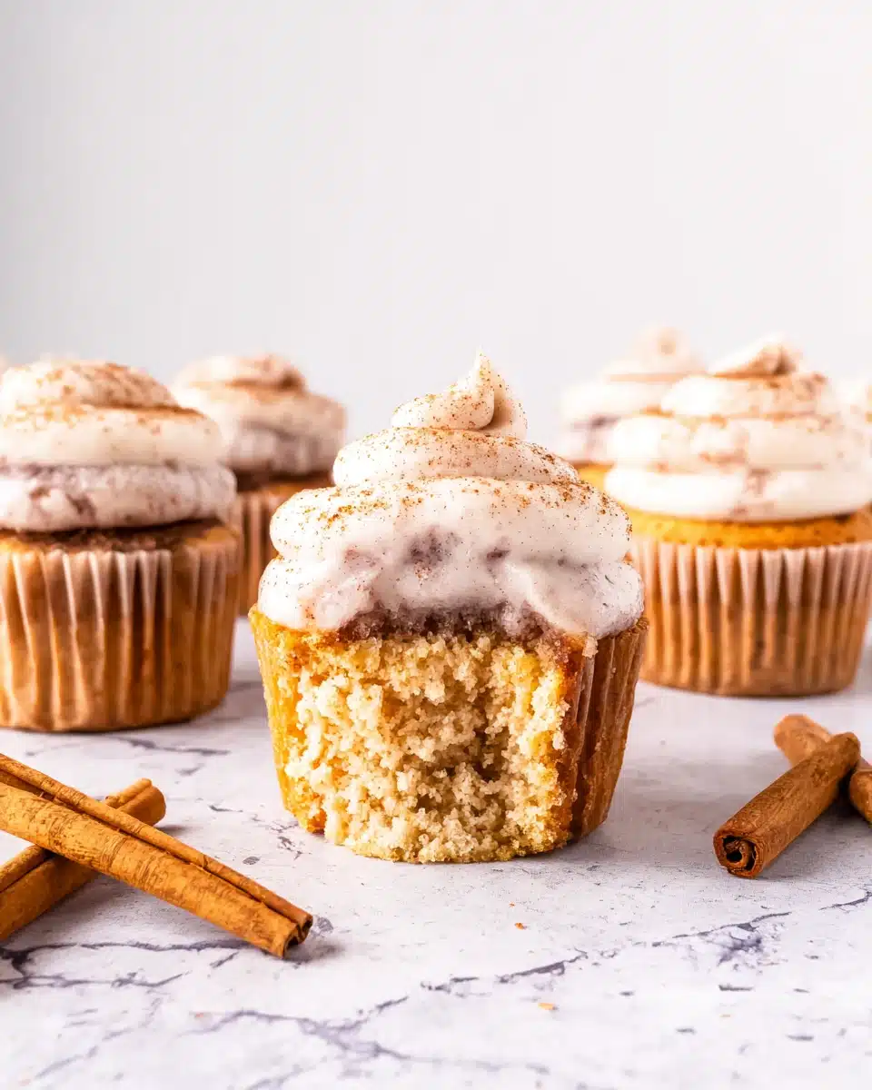Churro cupcakes with cream cheese frosting and cinnamon.
