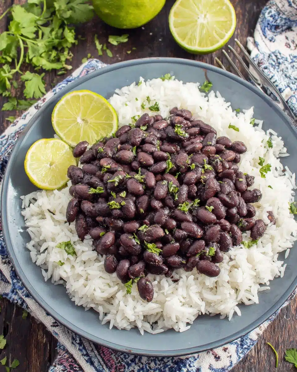 Savory Cuban style black beans over rice, garnished with parsley.
