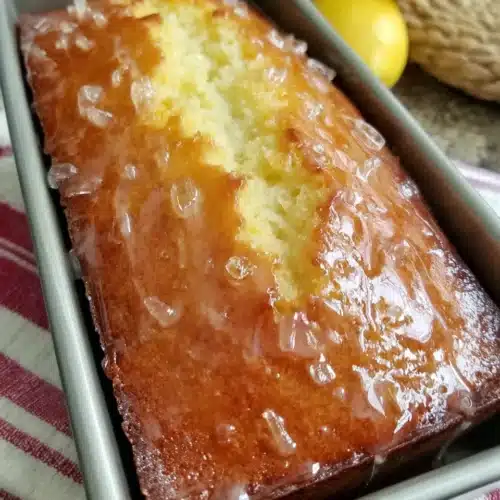 Moist lemon drizzle loaf cake perfect for any occasion.