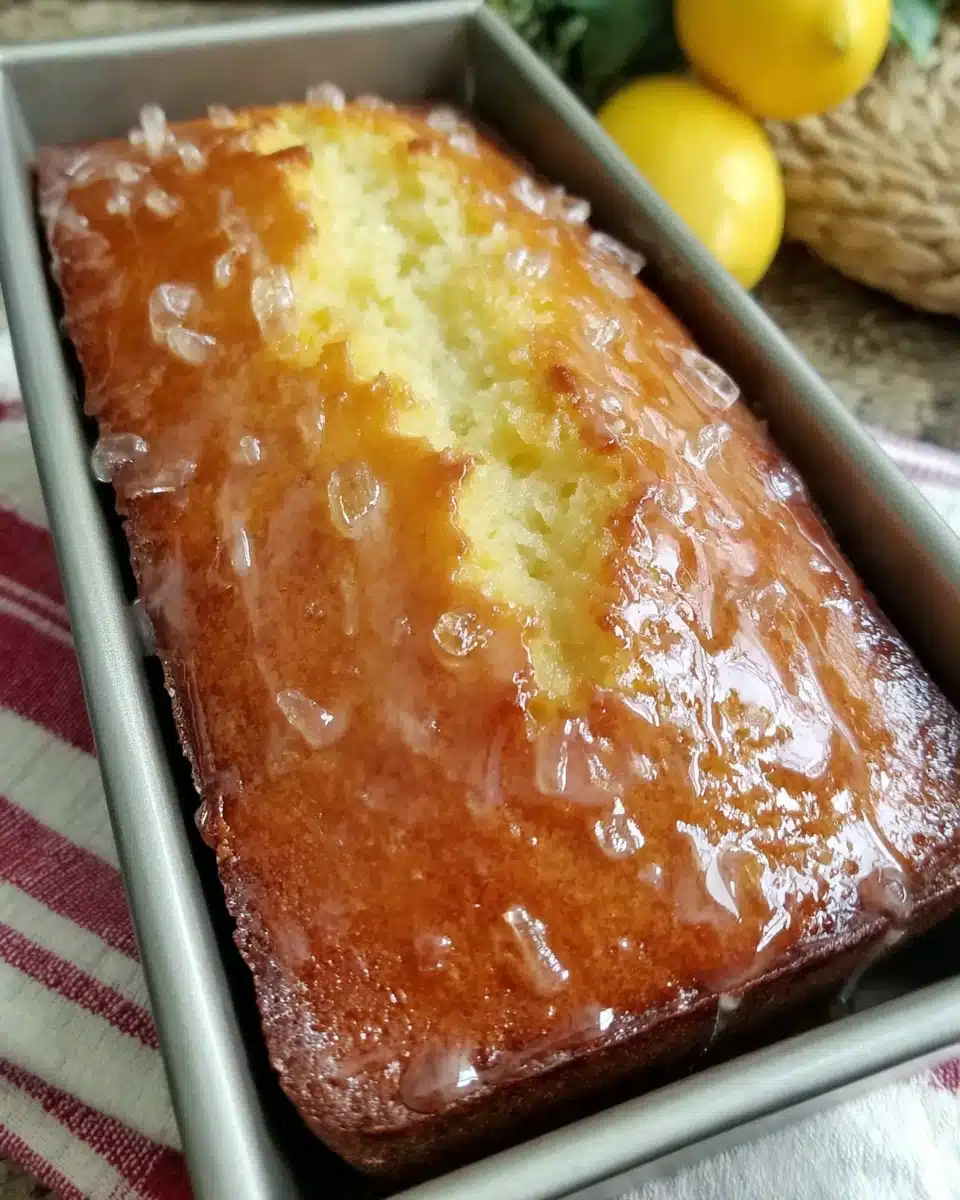 Moist lemon drizzle loaf cake perfect for any occasion.