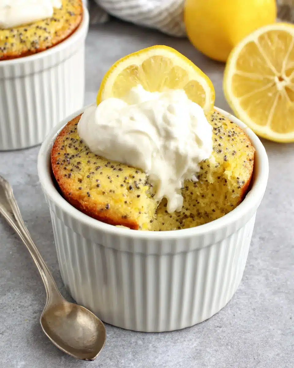 Quick lemon poppy seed mug cake with creamy topping.