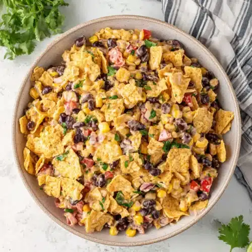 Mexican corn salad with black beans and Fritos.