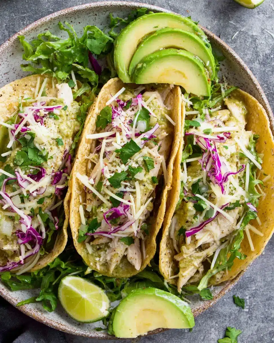 Salsa verde chicken tacos with fresh toppings.