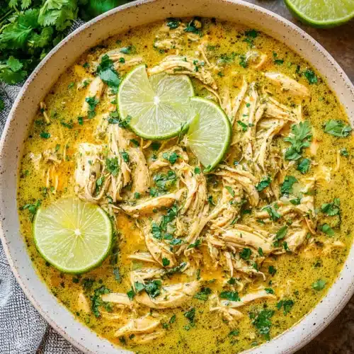 Delicious slow cooker green chile chicken ready to serve.