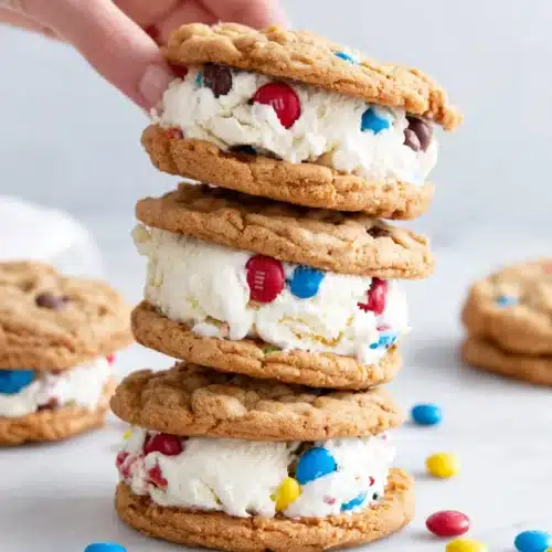 4th of July cookies with M&Ms stacked as ice cream sandwiches, featuring red, white, and blue candies.