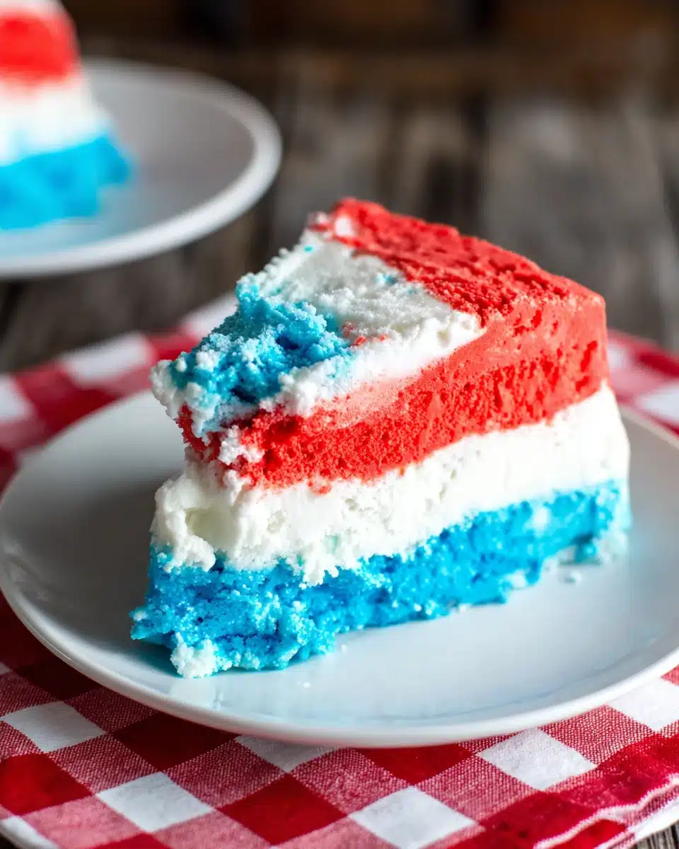 Patriotic Neapolitan ice cream with red, white, and blue layers on a plate