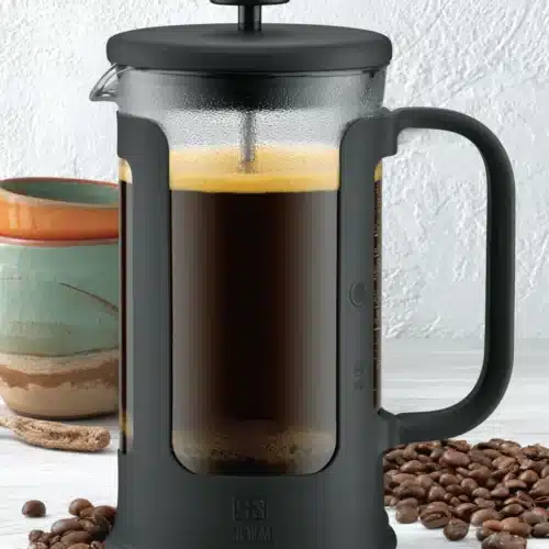 Salted Caramel Cream Cold Brew: Indulgent and Refreshing 1 Salted caramel cream cold brew in a French press with creamy foam layer