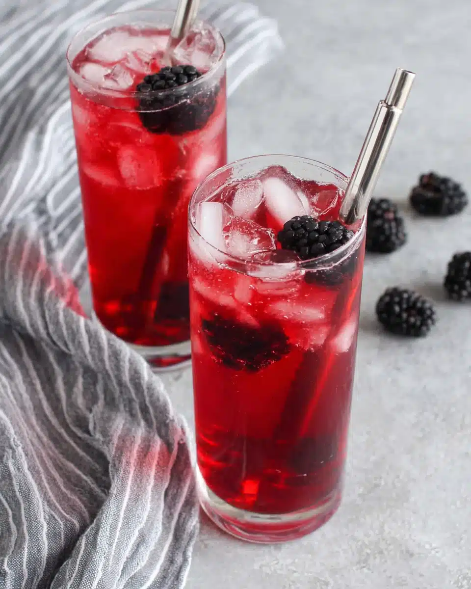 Starbucks Very Berry Hibiscus Refresher with Blackberries Starbucks Very Berry Hibiscus Refresher with blackberries and ice in a glass