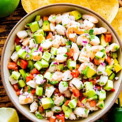 Avocado shrimp ceviche with tortilla chips and jalapeños
