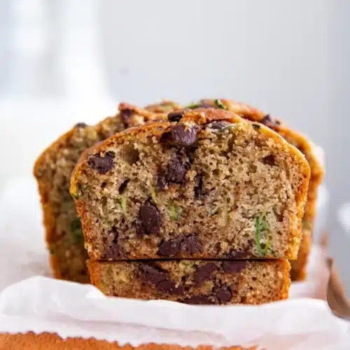 Healthy chocolate chip zucchini bread slice with visible zucchini and chocolate chips